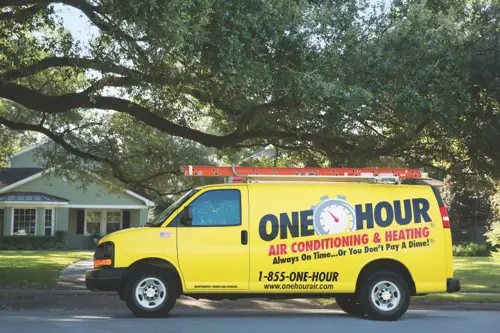 A One Hour Air conditioning Service Van outside a home in Lakeland FL.